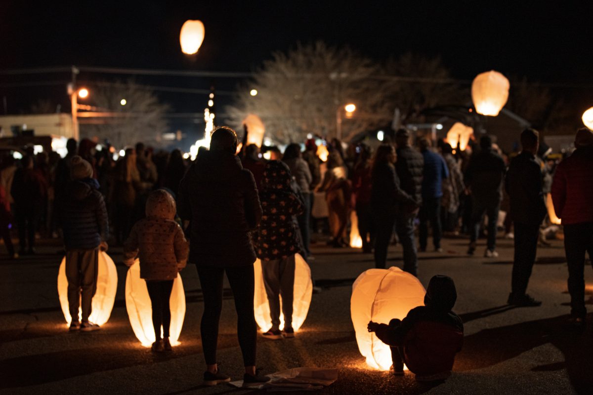 Children wait for hot air to fill their lanterns during the Lantern Festival during the Balloons and Tunes Roundup that takes place every year in Kanab, Utah.