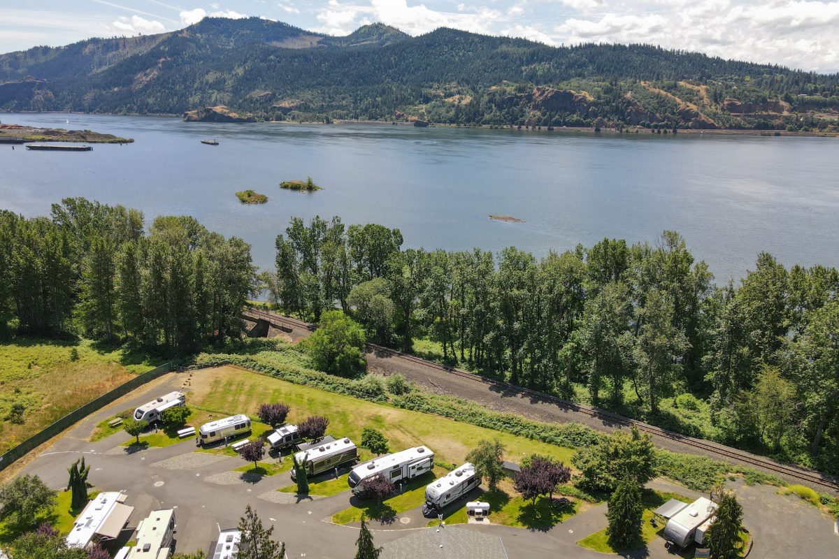 An aerial view of Gorge Base Camp in White Salmon, Washington, that looks out to the Columbia River, a popular camping destination for those on an Oregon road trip.