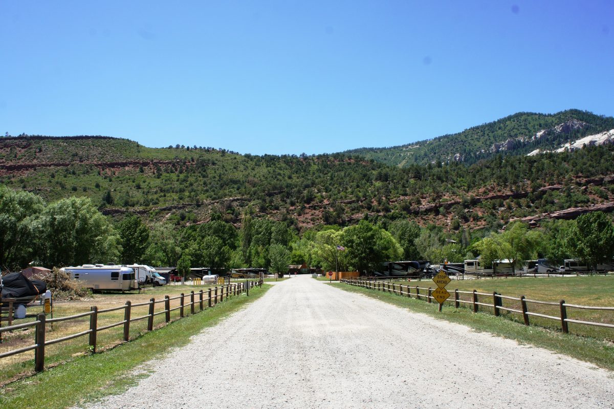 View of campground entrance mountain in the background at Aplen Rose RV Park