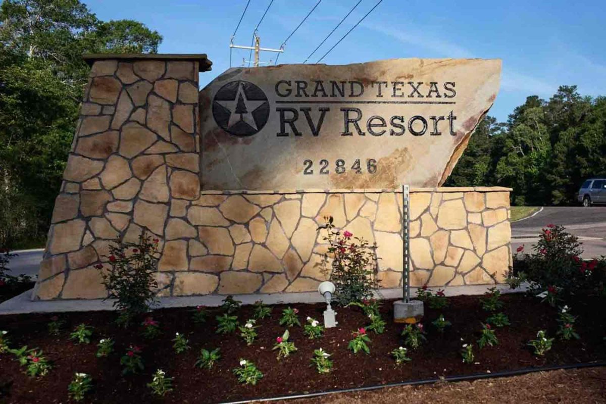 The stone entrance sign at Grand Texas RV Resort, a campground near Houston. 