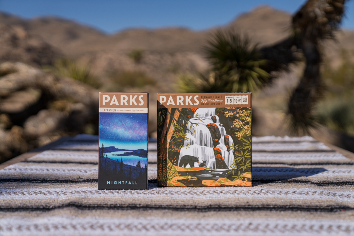 Parks Nightfall & PARKS boardgames outside on a table at Joshua tree National Park 
