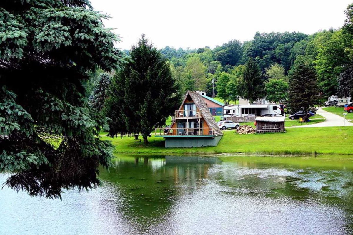 A-frame cabin next to lake