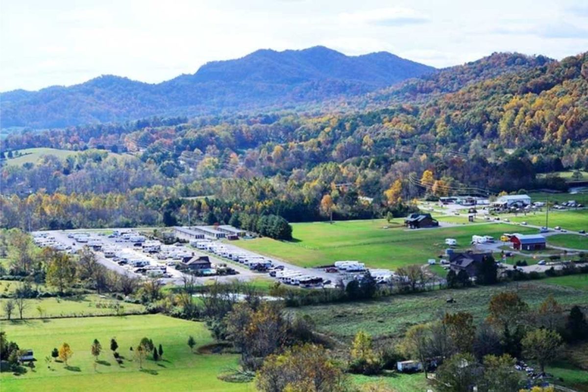 view of campground near Gatlinburg, TN, with many RVs next to the trees and mountains