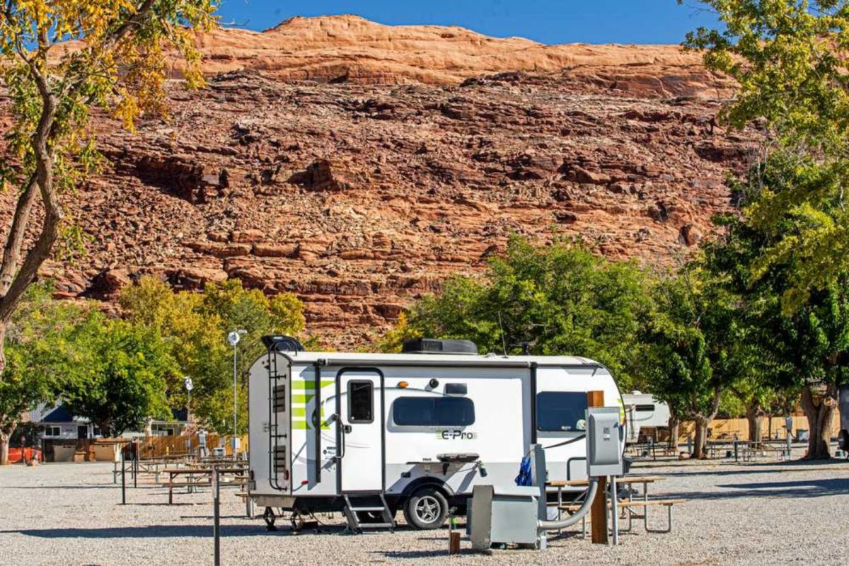 campground near Moab, UT with RV parked against canyon