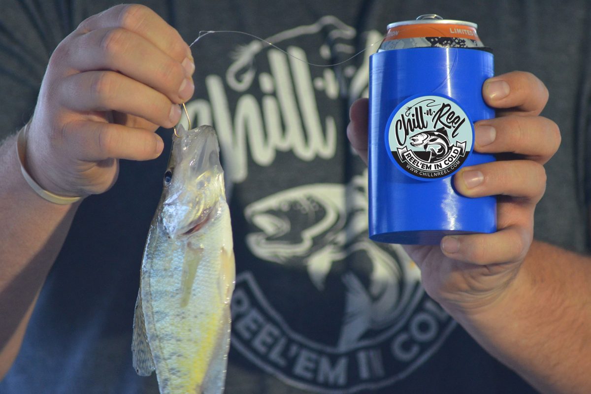 A chill-n-reel coozie and a fishing line that is attached to a fish. 
