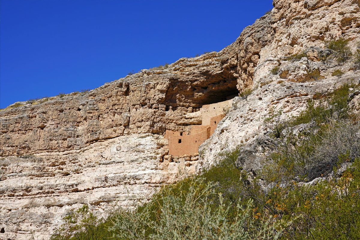 pueblo buildings built inside canyon wall at Camp Verde, one of the best places to camp