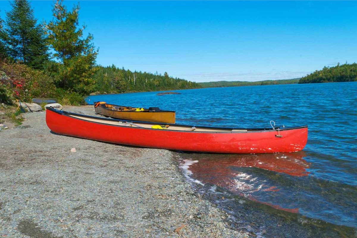 two kayaks ashore at Moose lake during spring