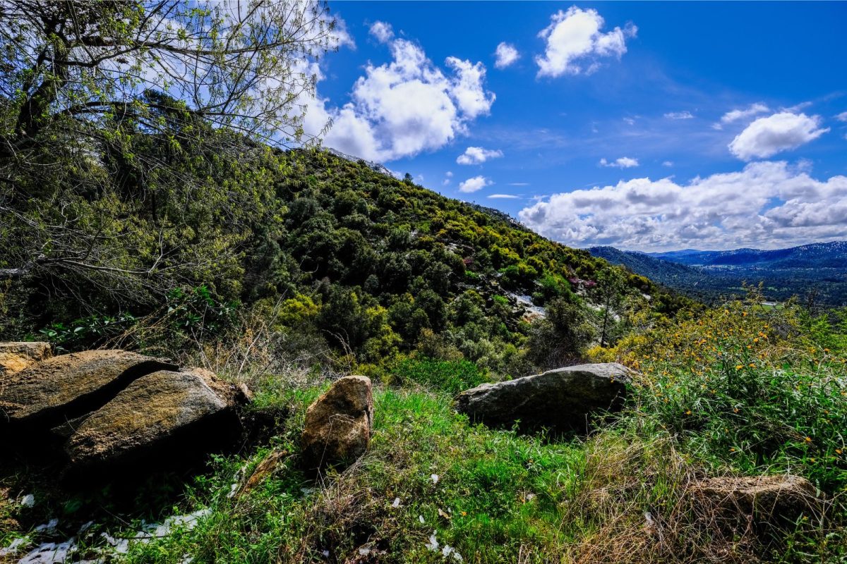 boulders and mountain sky for spring break camping near Friant, California