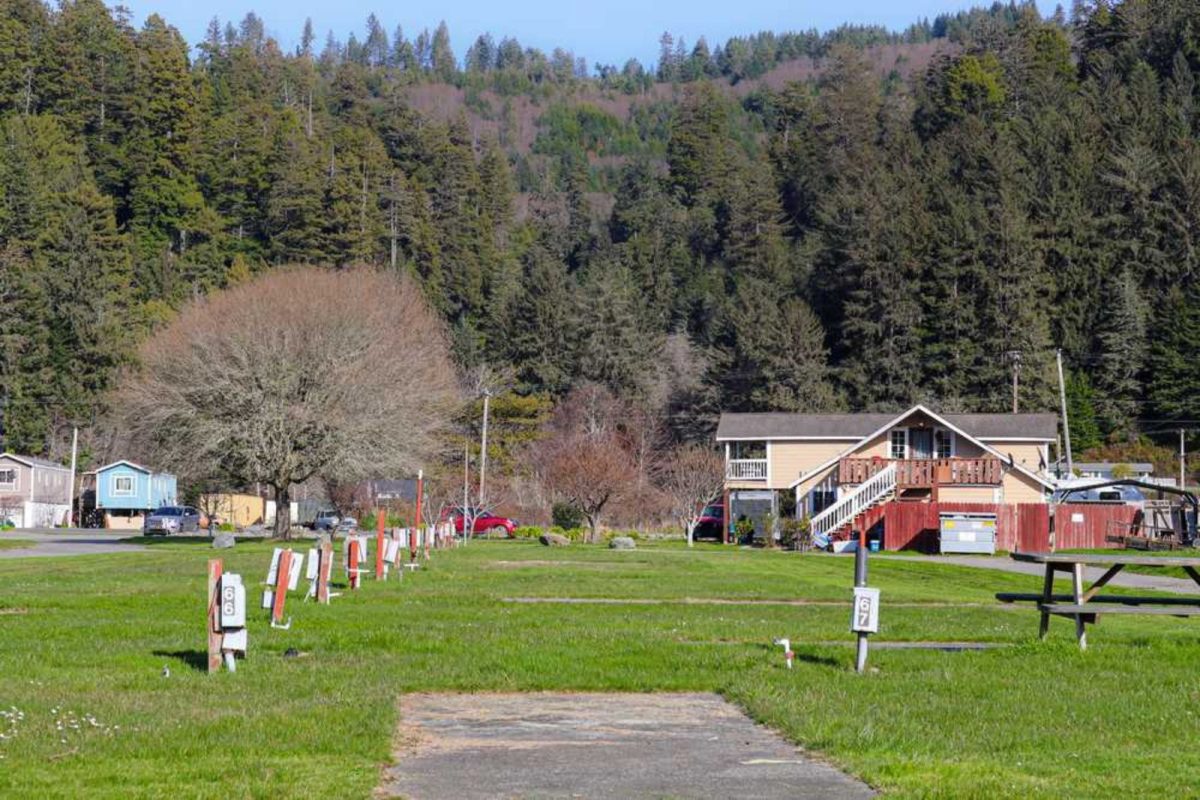 lodge in front of hills and trees at campground near Redwood National and State Parks